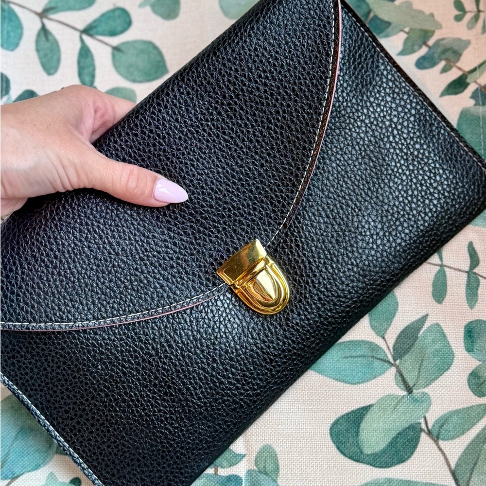 Elegant and Versatile Faux Leather Clutch/or Purse with Gold Buckle Accent.
